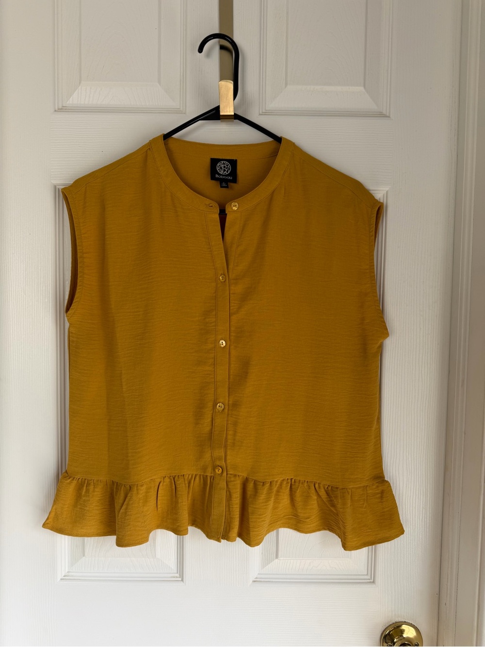 Loose Fitting Sleeveless Button-Front Ruffle-Hem Blouse — Mustard